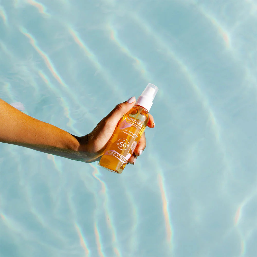 Huile solaire spf50 de la marque Mimitika